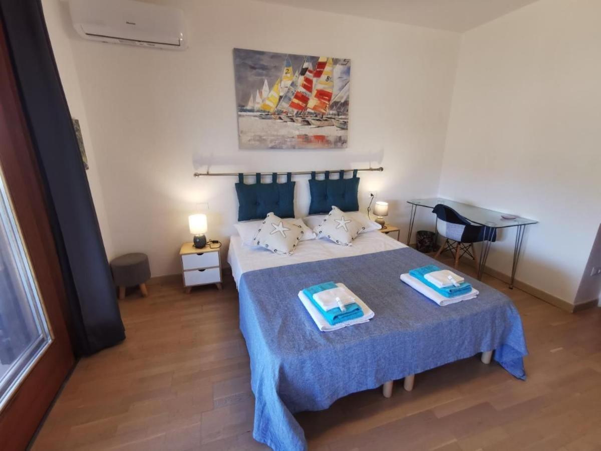 Comodo Appartamento Casa Razzoli Palau Exteriör bild