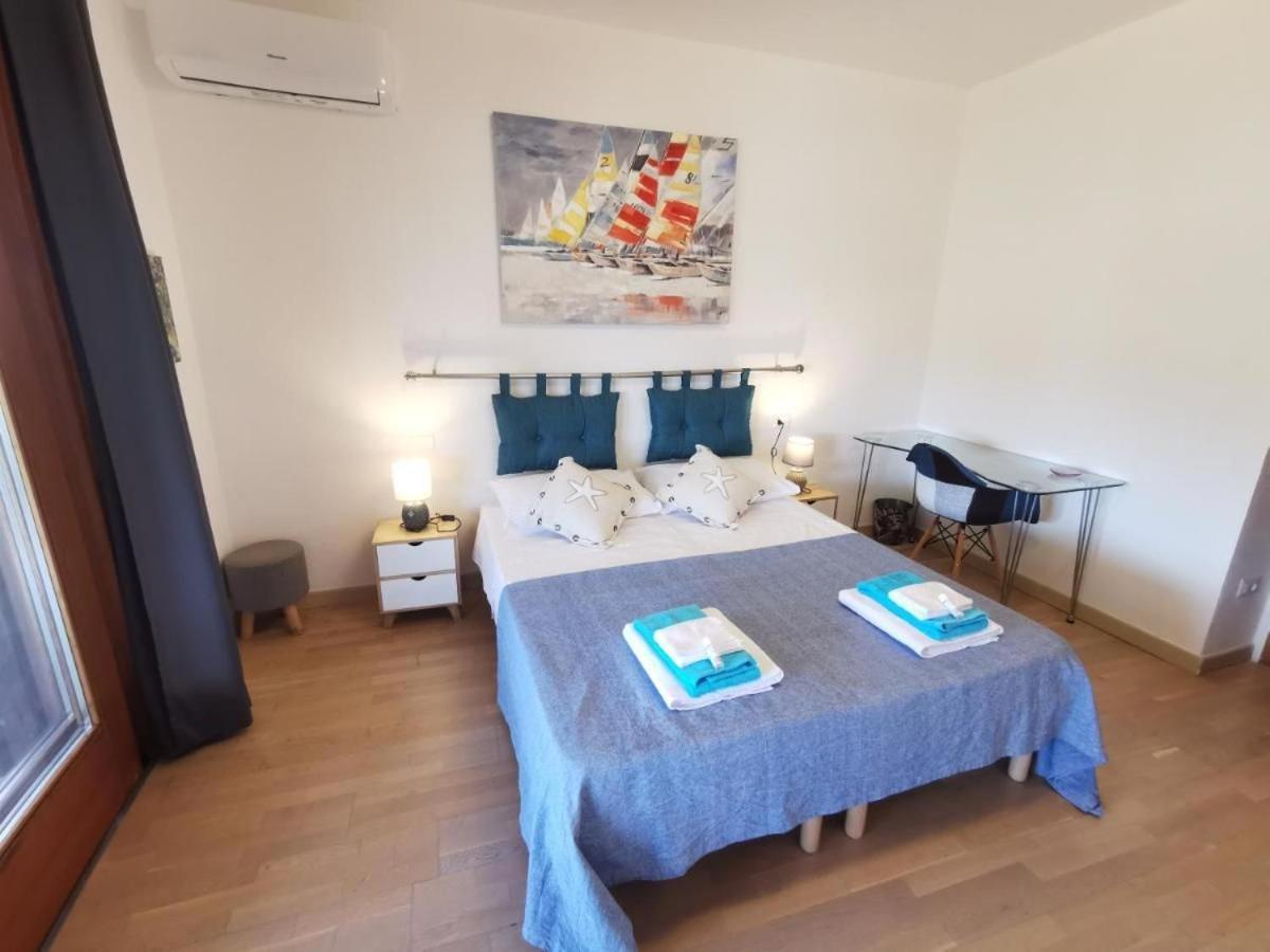 Comodo Appartamento Casa Razzoli Palau Exteriör bild