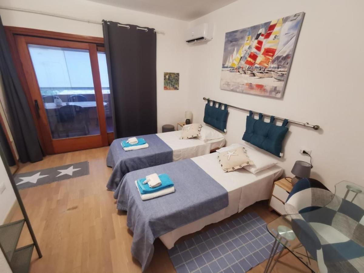 Comodo Appartamento Casa Razzoli Palau Exteriör bild